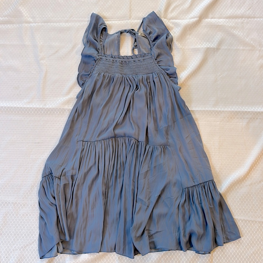 FREE PEOPLE FITS SIZE XS & S! Babydoll dress or long shirt. cute back that ties.